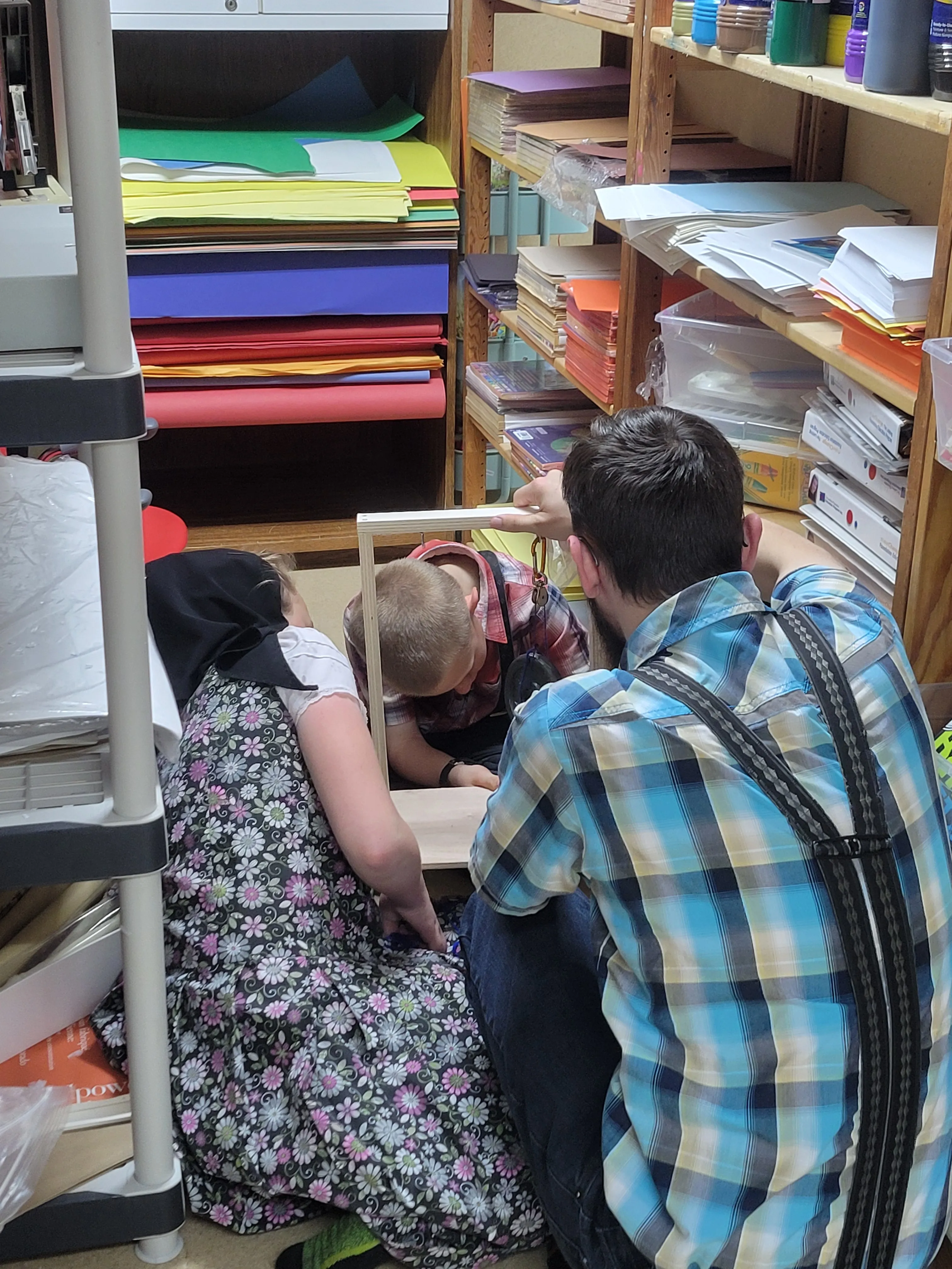 Students working on a pulley system activity